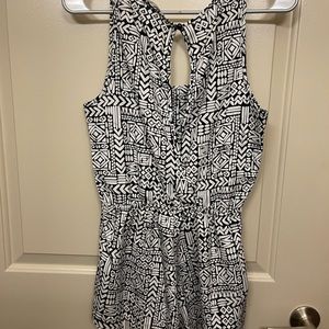 Black and white pattern romper in a size Medium